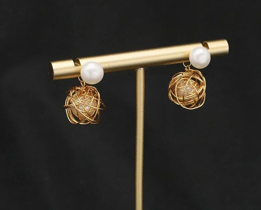 Miracle Heals Women's Golden Wireball Caged White Pearl Stud Earings